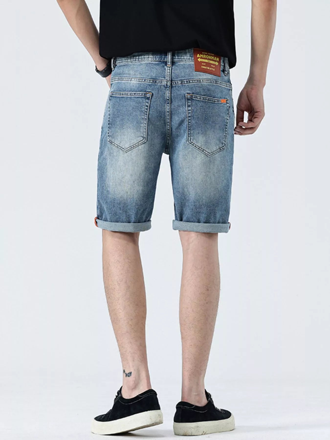 Lifestyle Image of Trendbye Men's Rolled Hem Denim Shorts