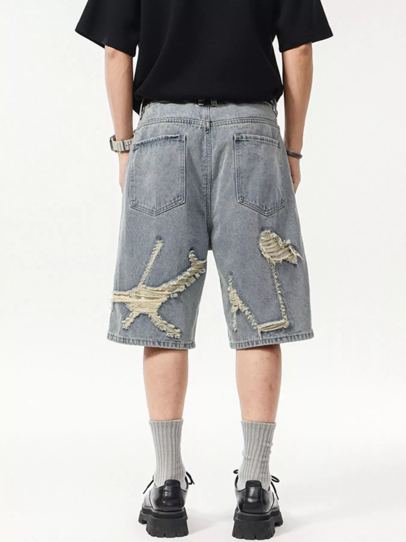 Lifestyle Image of Trendbye Men's Wash Distressed Denim Shorts