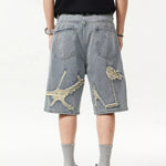 Lifestyle Image of Trendbye Men's Wash Distressed Denim Shorts