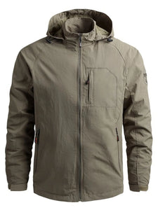 Green jacket with camouflage hood on a white background