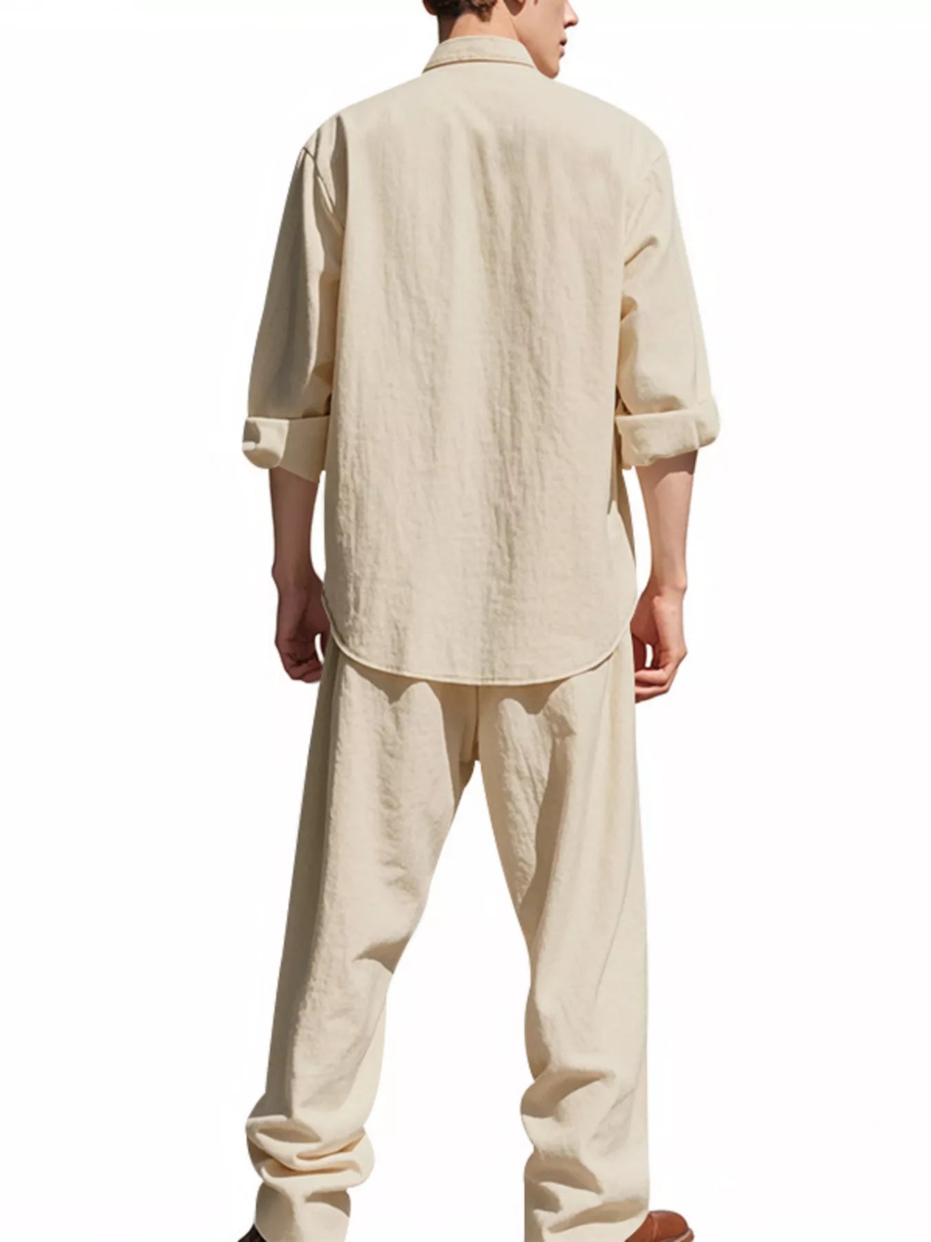 Trendbye Man wearing a beige linen shirt and pants sets