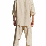 Trendbye Man wearing a beige linen shirt and pants sets