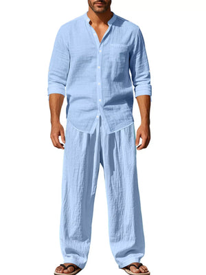 Trendbye Man wearing a light blue linen shirt and pants on a white background