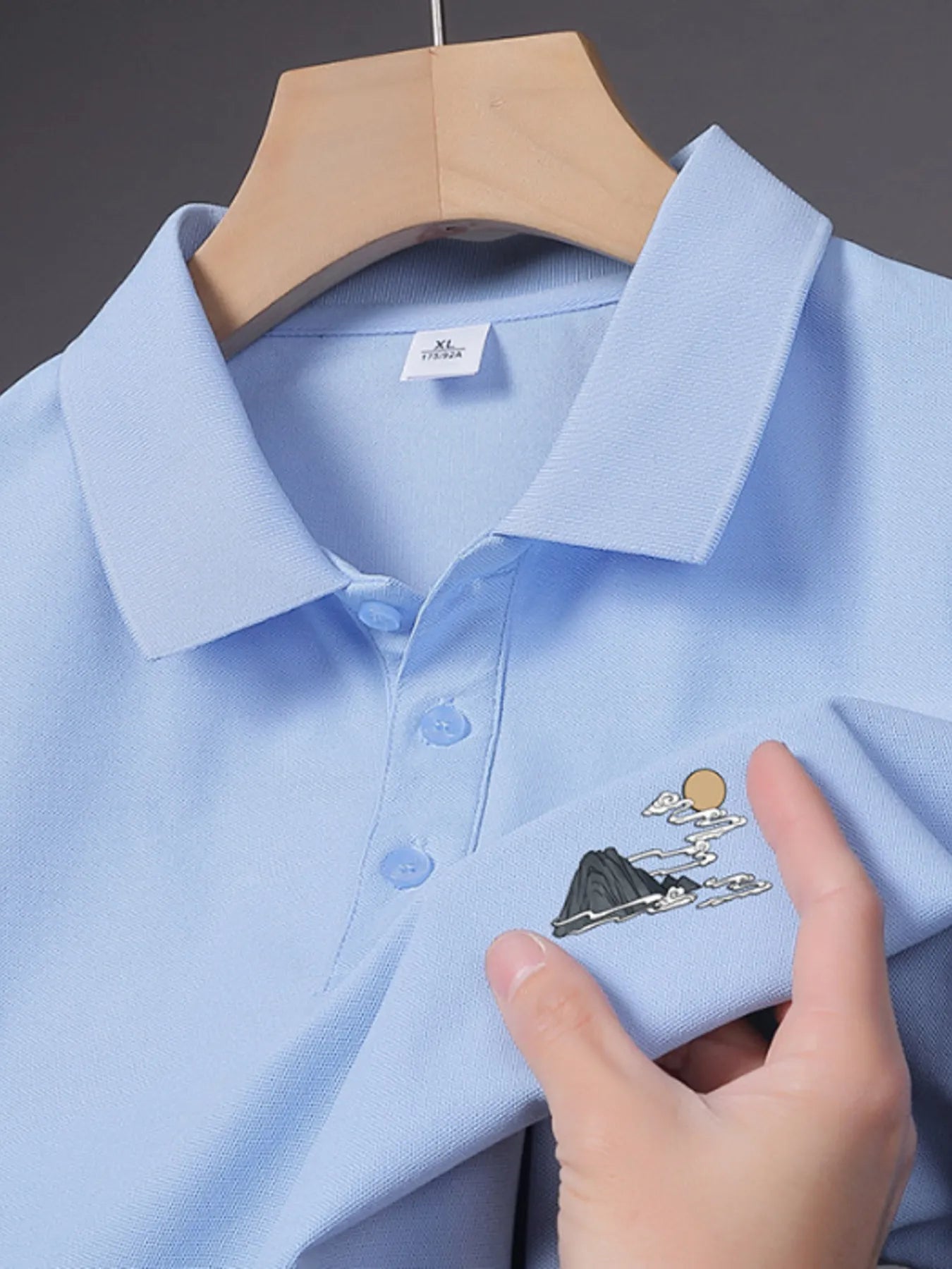 Trendbye Men's Light blue polo shirt with embroidered design