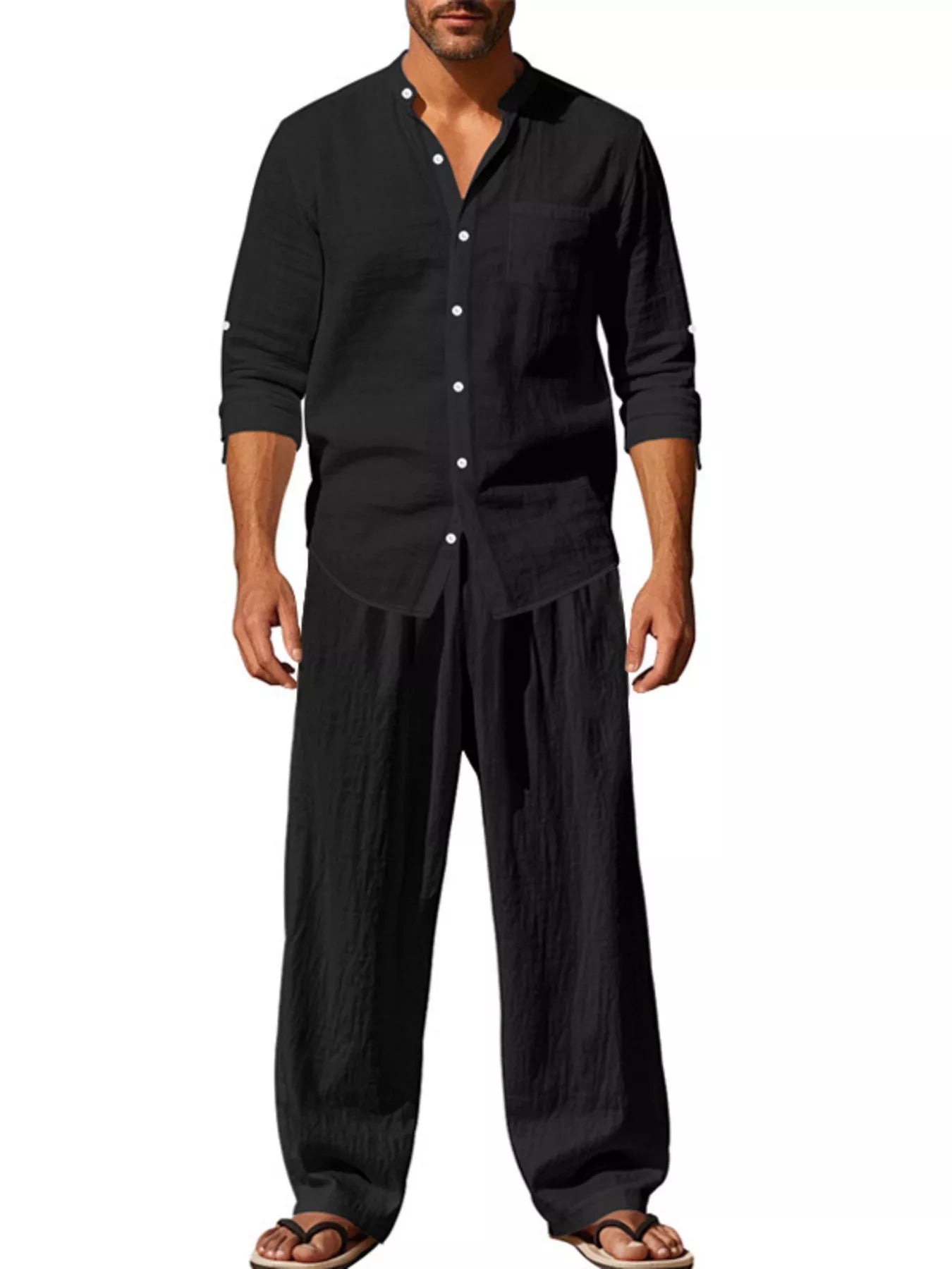 Trendbye Men's wearing a black button-up shirt and wide-leg pants