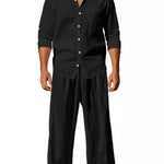 Trendbye Men's wearing a black button-up shirt and wide-leg pants