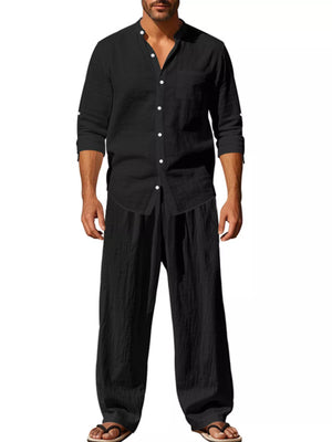 Trendbye Men's wearing a black button-up shirt and wide-leg pants