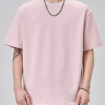 Trendbye Men's wearing a light pink t-shirt