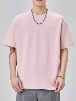 Trendbye Men's wearing a light pink t-shirt