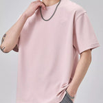 Trendbye Men's wearing a pink t-shirt with