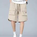 Trendbye Men's wearing beige shorts