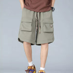Trendbye Men's wearing green cargo shorts