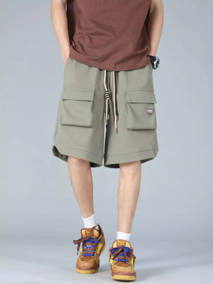Trendbye Men's wearing green cargo shorts