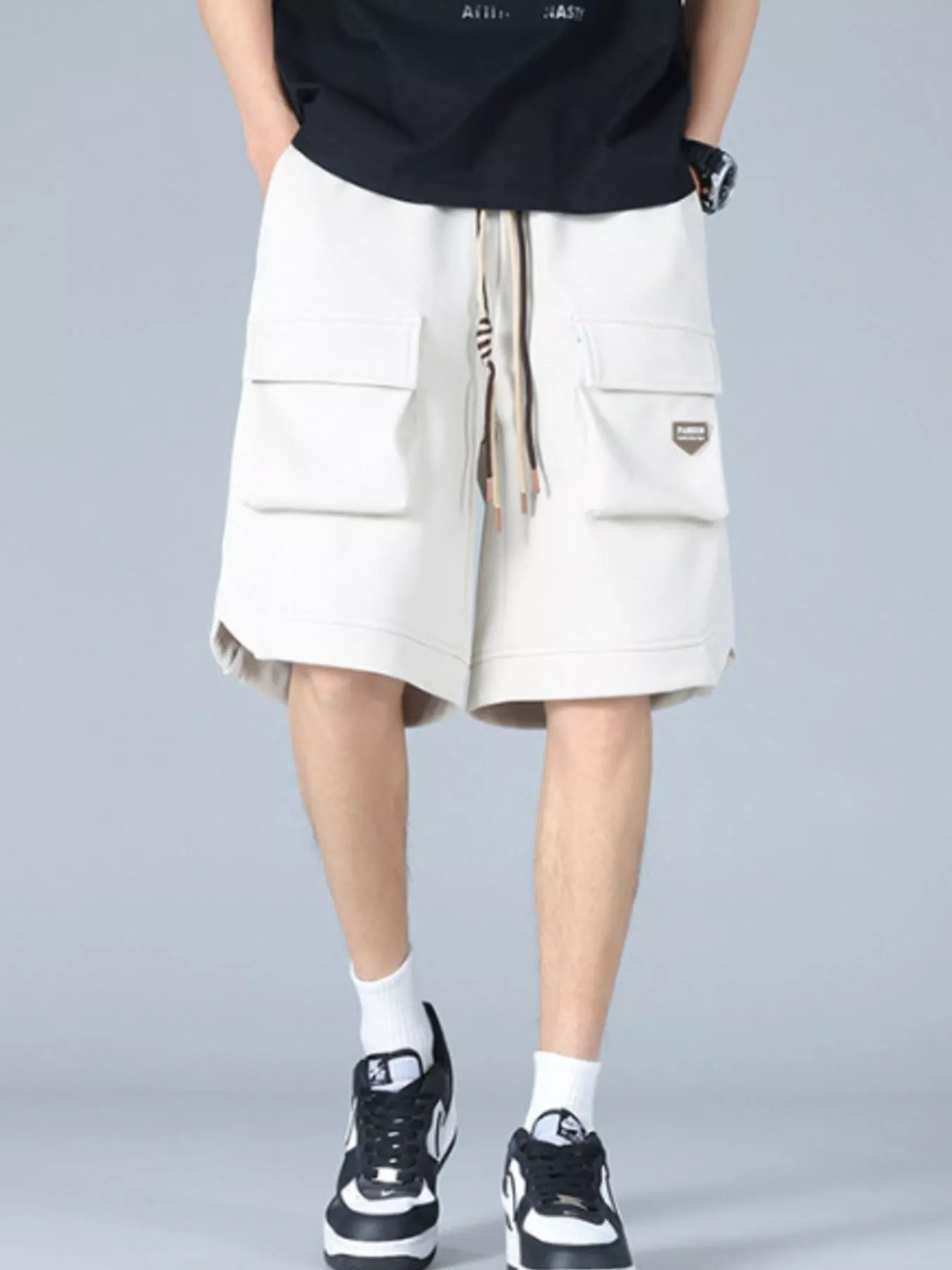 Trendbye men's wearing white cargo shorts