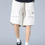 Trendbye men's wearing white cargo shorts