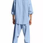 Trendbye wearing a light blue shirt and pants set