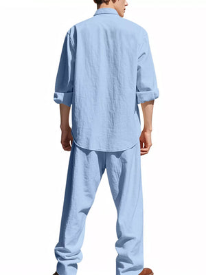 Trendbye wearing a light blue shirt and pants set