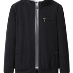 Black jacket with a small logo on a white background
